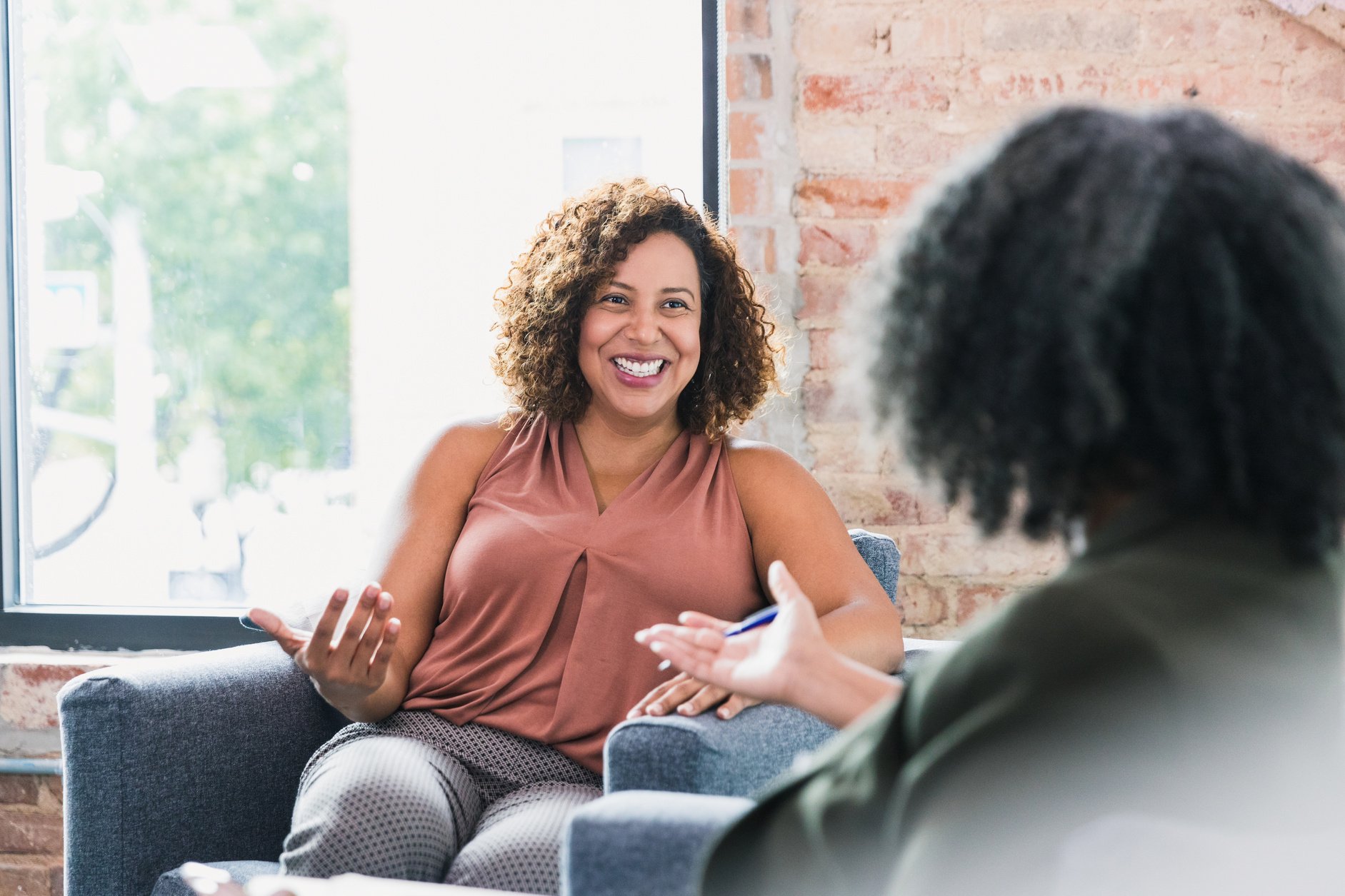 Therapy patient smiles during therapy session